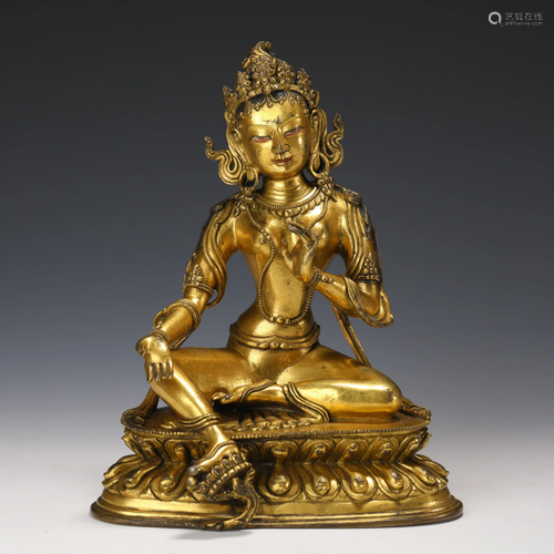 A Tibetan Bronze Gilt Green Tara