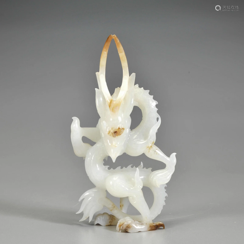 A Carved White Jade Dragon Qing Dynasty