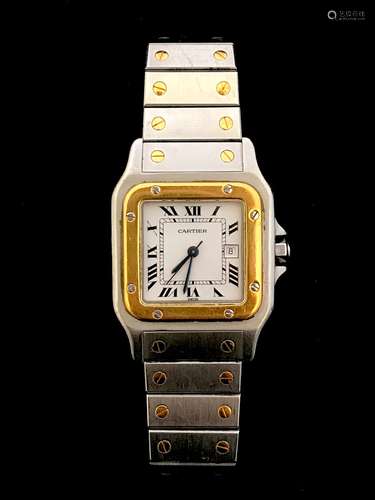 CARTIER, SANTOS. Montre bracelet en acier et or jaune 18k 75...