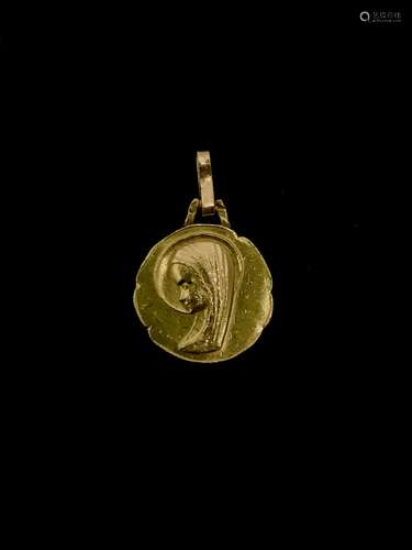 Médaille en or jaune 18k 750°/00 orné du profile de la Vierg...