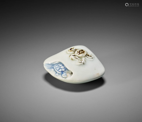 A RARE HIRADO PORCELAIN NETSUKE OF A CLAM