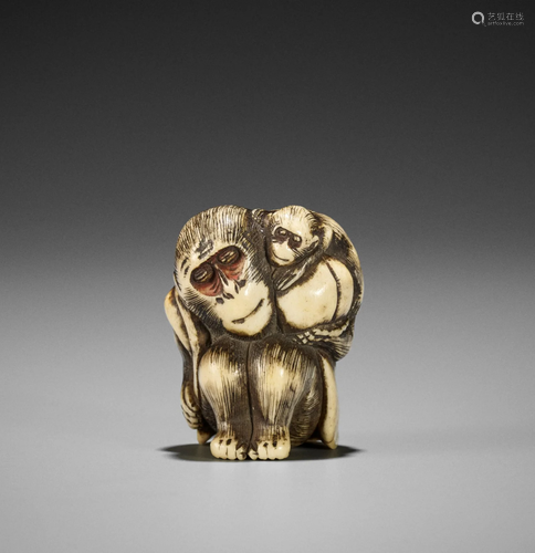 A STAG ANTLER NETSUKE OF A MONKEY