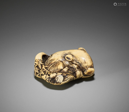 A RARE KYOTO SCHOOL STAG ANTLER NETSUKE OF A BOAR