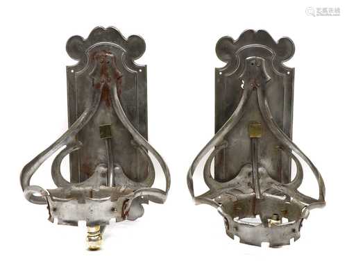 A pair of Art Nouveau pewter wall appliques,