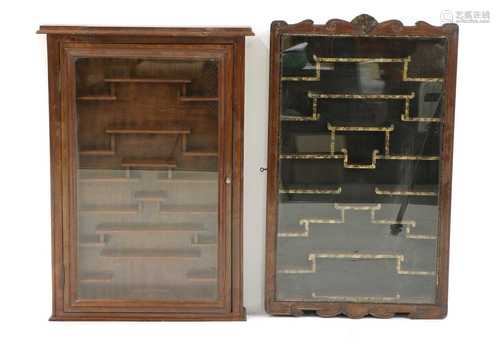 Two modern wall mounted display cabinets,