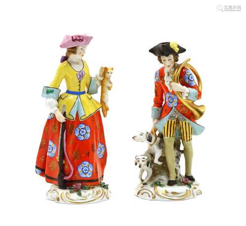 A pair of Continental porcelain figurines,