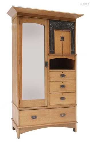 An Arts & Crafts oak single wardrobe,