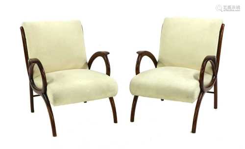 A pair of walnut lounge chairs