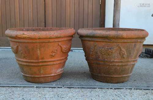 A large pair of terracotta planters of tapering cylindrical ...