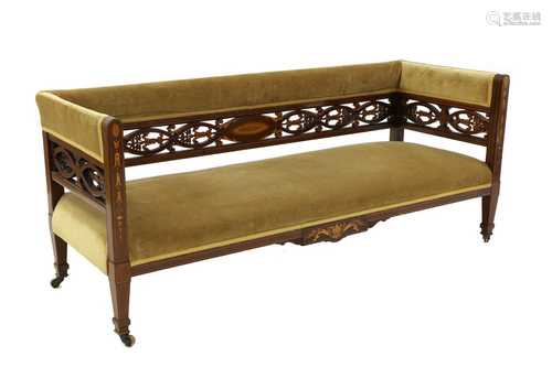 An Edwardian mahogany salon settee,