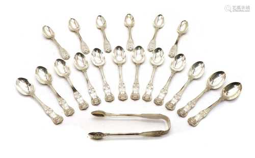 A quantity of silver teaspoons and tongs,