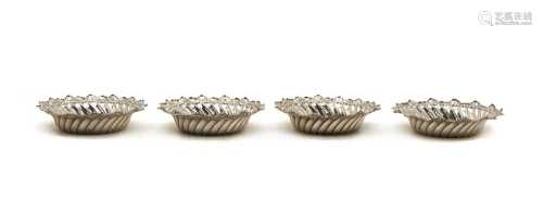 A set of four Victorian silver bonbon dishes,