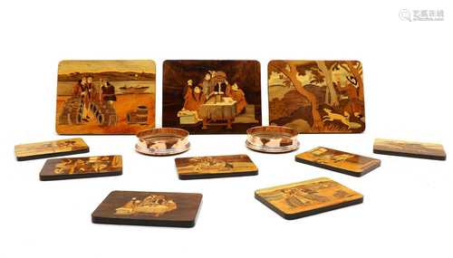 A collection of marquetry placemats