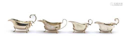 A pair of silver sauceboats,