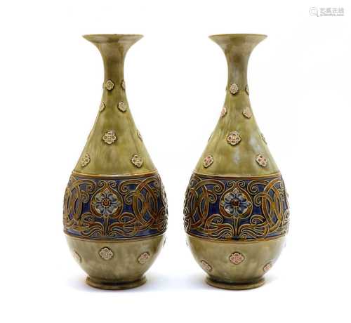 A pair of Doulton stoneware vases,