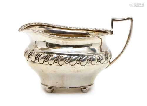 An Edwardian Irish silver sauce boat,