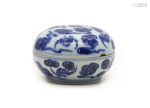 A Chinese blue and white box and a matching cover,