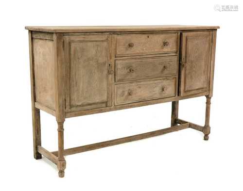 A Cotswold School oak sideboard,