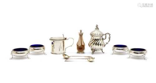 A George III set of four silver cauldron salt cellars