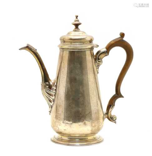 A silver coffee pot,