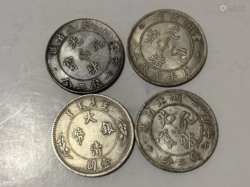 Four Chinese Coins