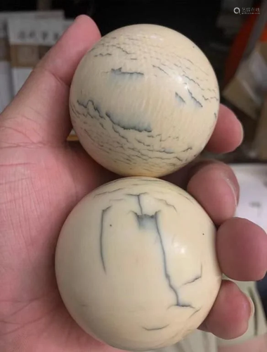 Two Bone Carved Balls