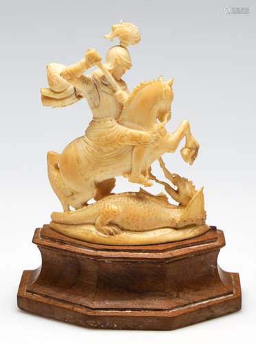 A Carved Antique Ivory Figure of a Warrior on Horseback Slay...