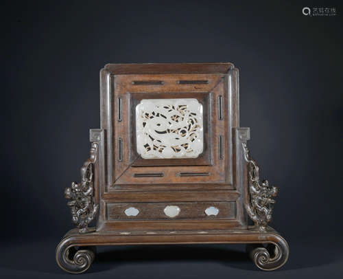 A wood screen inlaid with jade