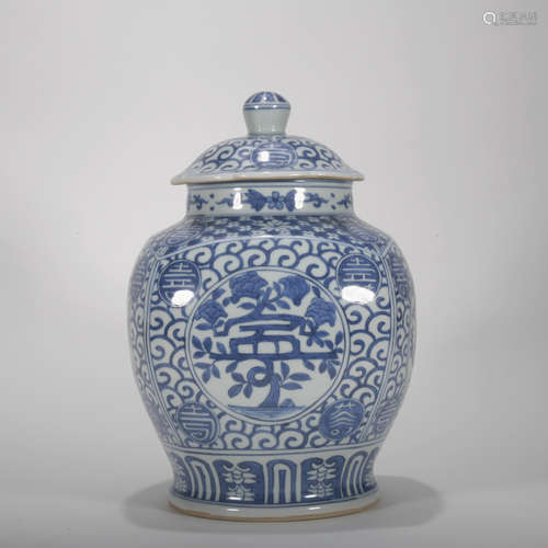 A blue and white jar and cover