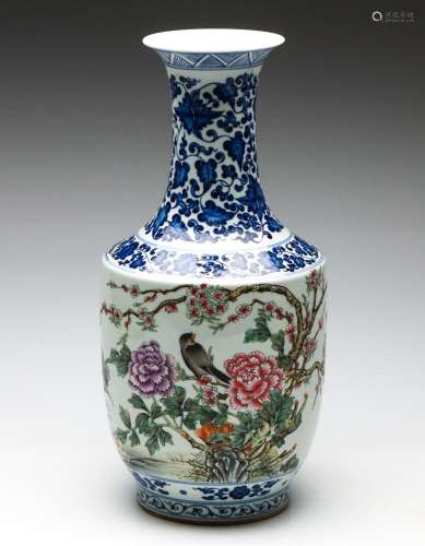 A Large Chinese Blue and White Ceramic Rotating Vase Featuri...