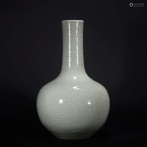 A celadon-glazed vase