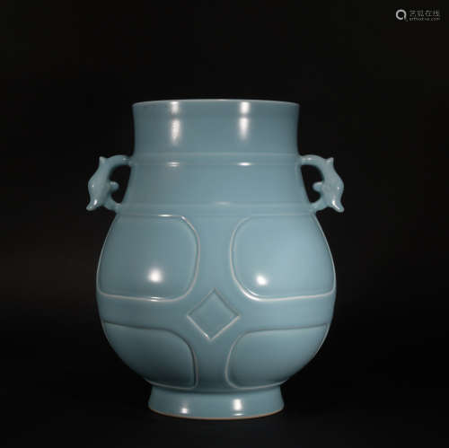 A celadon-glazed jar