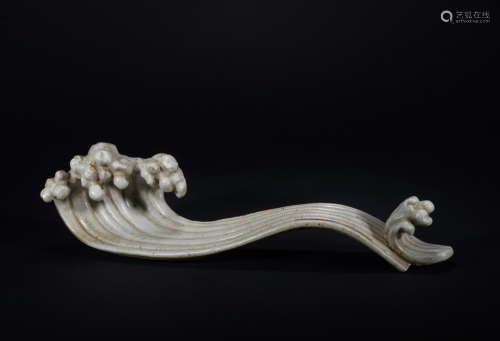A carved porcelain penholder