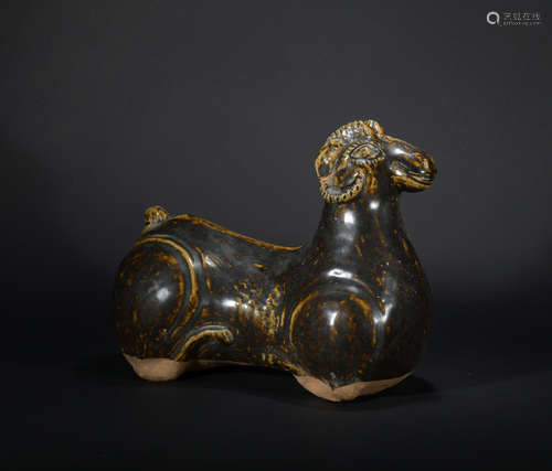 A brown glazed sheep sculptures