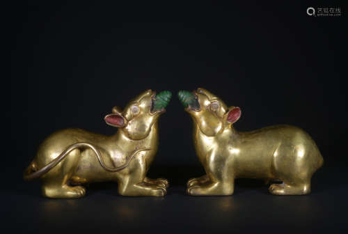 A pair of gilt-bronze mouse