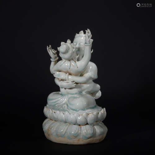 A celadon-glazed buddha