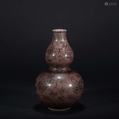 A brown glazed gourd-shaped vase
