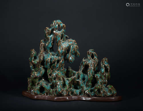 A carved porcelain mountain