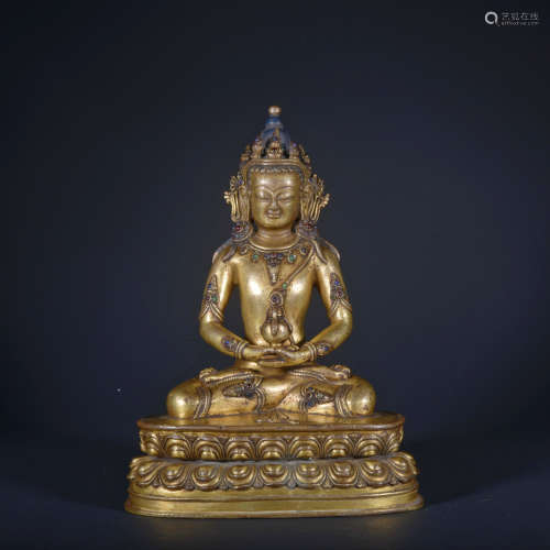 A gilt-bronze statue of Amitayus