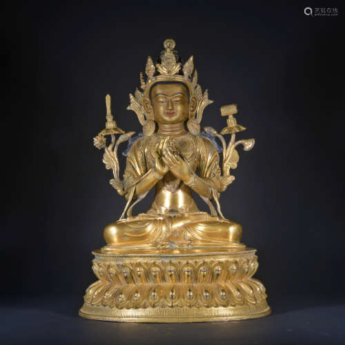 A gilt-bronze statue of Manjusri