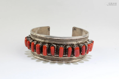 A silver Bangle, handmade, and hand beaded with Co