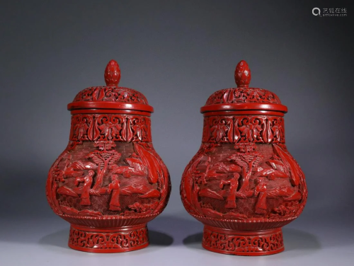 Two Carved Cinnabar Lacquer Landscape Vases and Covers