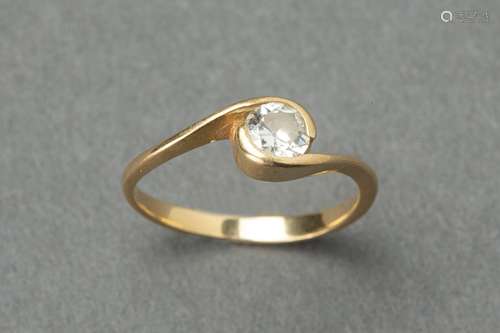 Bague en or jaune , monture croisée retenant un diamant de t...