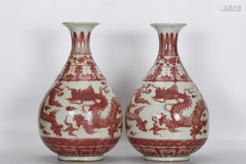 PAIR OF UNDERGLAZE-RED 'DRAGON AND LOTUS' PEAR-FORM
