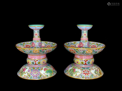 PAIR OF BLUE-GROUND FAMILLE-ROSE 'FLORAL' CANDLESTICKS