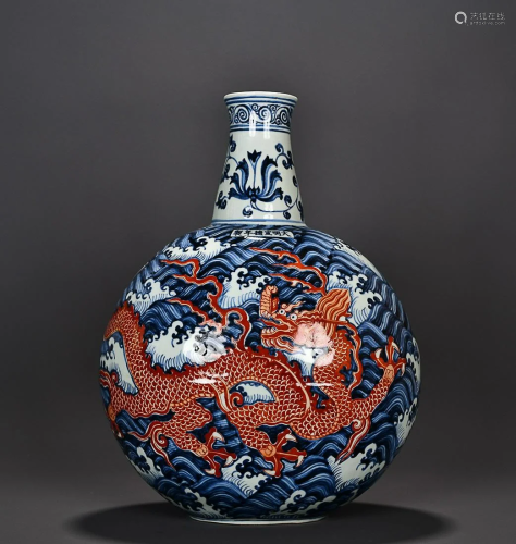 BLUE & WHITE AND IRON-RED 'DRAGON AMONG OCEAN' EWER