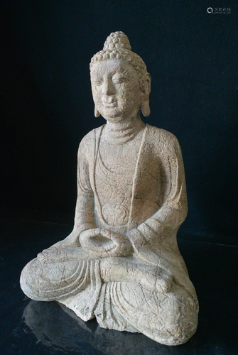 A CARVED STONE BUDDHA STATUES. China Ancient times