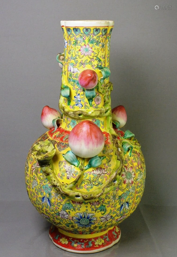 Yellow-glazed famille rose vase made of peach blossoms