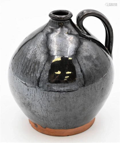 Redware Small Jug, having handle and dark brown glaze,