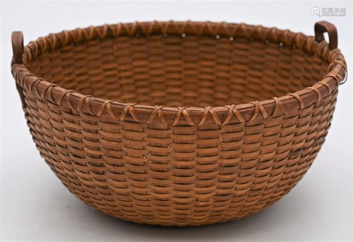 Nantucket Basket, having two heart shaped handles,